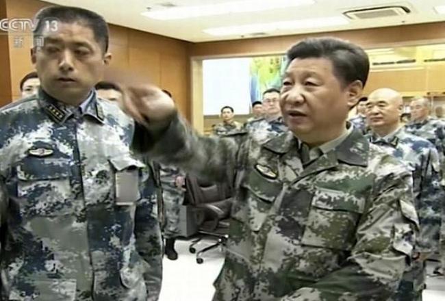 Xi takes Commander-in-Chief title as military reforms peak