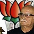Advani gives it back to Modi