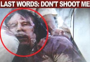 Gaddafi found hiding in a hole and said don't shoot, don't shoot