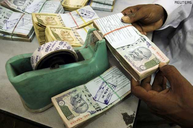 India revises 2010-11 economic growth down to 8.4 pc