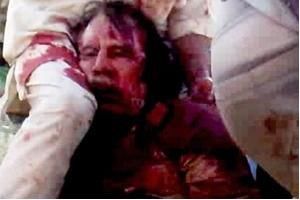 Libya's Gaddafi burial delayed until location set: Official