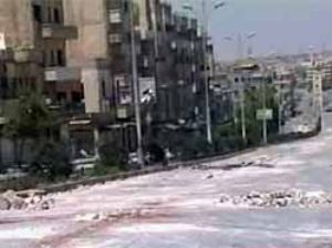 Syrian troops storm 2 towns killing at least 4