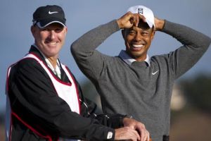 Tiger returns with new caddie, old hunger to win